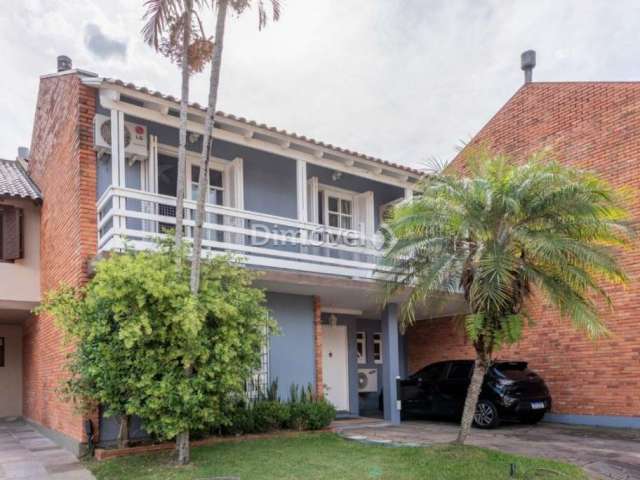 Casa em condomínio fechado com 5 quartos à venda na Rua Conrado Ferrari, 71, Jardim Isabel, Porto Alegre por R$ 900.000