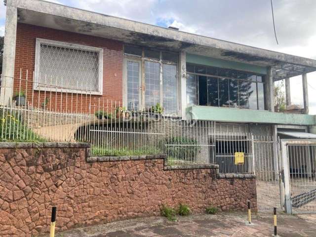 Casa com 4 quartos à venda na MONROE, 171, Praia de Belas, Porto Alegre por R$ 1.750.000