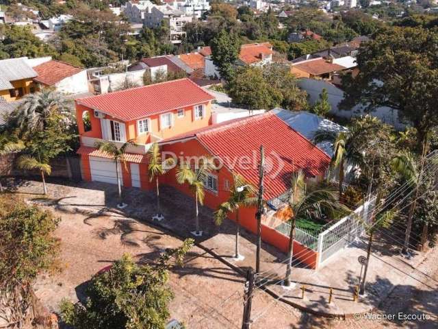 Casa com 4 quartos à venda na Rua Alfredo Varela, 0305, Teresópolis, Porto Alegre por R$ 750.000