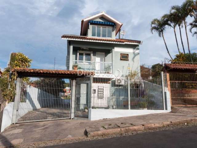 Casa em condomínio fechado com 3 quartos à venda na Rua Landel de Moura, 1831, Tristeza, Porto Alegre por R$ 600.000
