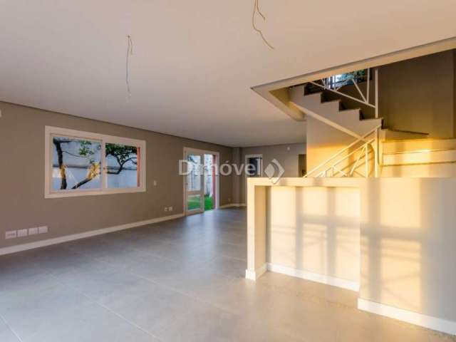 Casa em condomínio fechado com 4 quartos à venda na Avenida Guaíba, 4400, Vila Assunção, Porto Alegre por R$ 1.300.000