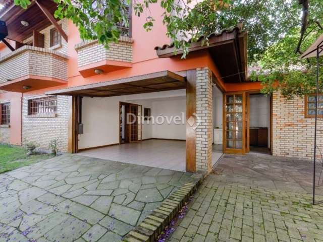 Casa com 3 quartos à venda na Avenida Guaíba, 10710, Ipanema, Porto Alegre por R$ 1.180.000