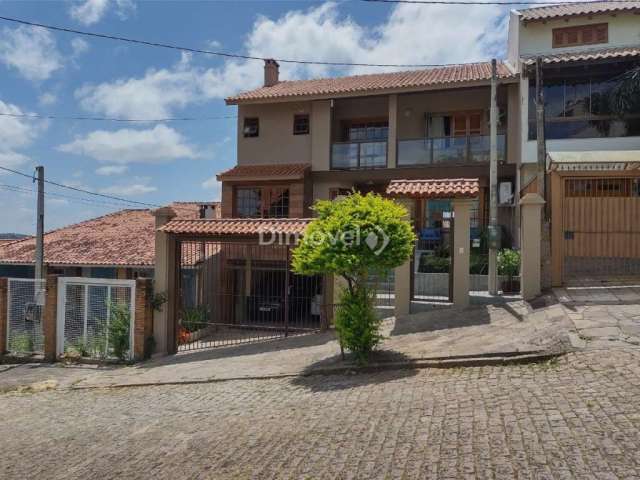 Casa com 3 quartos à venda na Rua Inês Vinhas, 45, Espírito Santo, Porto Alegre por R$ 990.000
