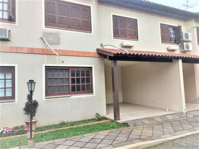Casa em condomínio fechado com 3 quartos à venda na Rua Soledade, 126, Centro, Esteio por R$ 470.000