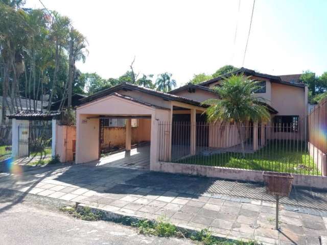 Casa com 4 quartos à venda na Rua Cruz Alta, 294, Centro, Esteio por R$ 700.000