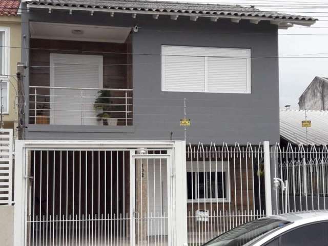 Casa com 4 quartos à venda na Rua Jardim América, 102, Harmonia, Canoas por R$ 750.000