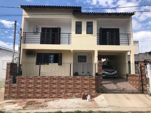 Casa com 3 quartos à venda na Rua Jerônimo Pires de Almeida, 57, COHAB, Sapucaia do Sul por R$ 649.000