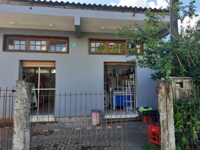 Casa com 1 quarto à venda na Rua Vitor Mateus Teixeira, 77, Vila Três Marias, Esteio por R$ 350.000