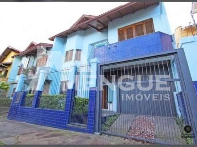 Casa com 3 quartos à venda na Rua Henrique Lopes dos Santos, 105, Jardim Itu Sabará, Porto Alegre por R$ 699.000