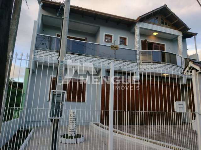 Casa com 3 quartos à venda na Rua Oscar Ferreira, 250, Rubem Berta, Porto Alegre por R$ 650.000