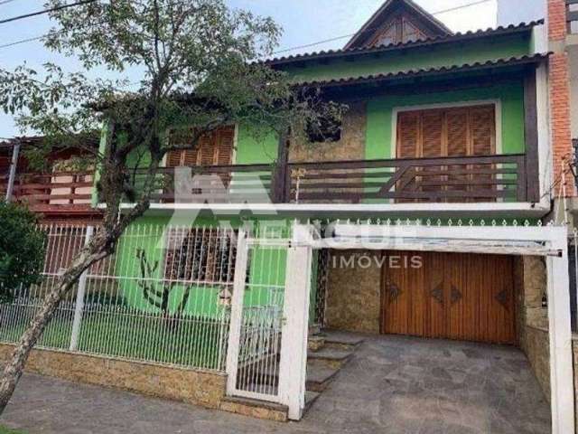 Casa em condomínio fechado com 4 quartos à venda na Rua Veronese, 62, São Sebastião, Porto Alegre por R$ 1.250.000