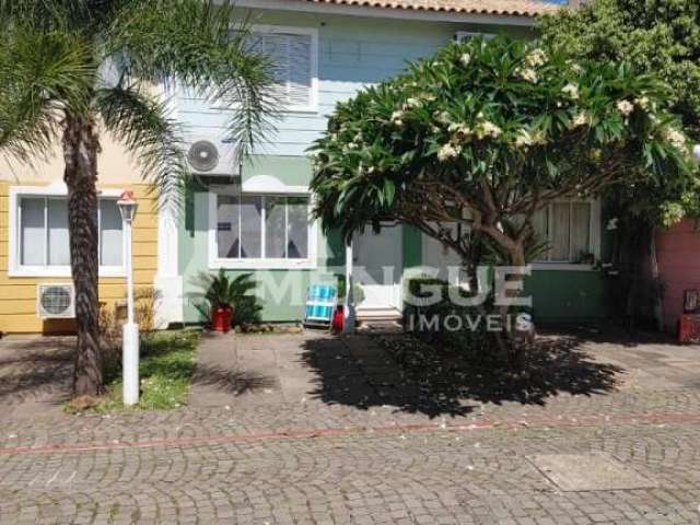 Casa em condomínio fechado com 3 quartos à venda na Rua Engenheiro Frederico Dahne, 255, Sarandi, Porto Alegre por R$ 475.000