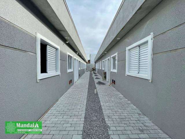 Village com 2 dormitórios à venda, 51 m² por R$ 220.000,00 - Chácara Vista Linda - Bertioga/SP