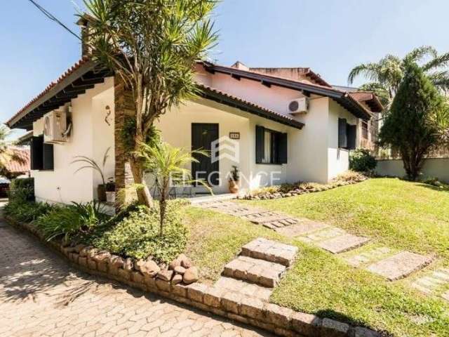 Casa com 4 quartos à venda na Rua Pedro A A De Freitas Filho, 186, Jardim Itu Sabará, Porto Alegre por R$ 1.200.000