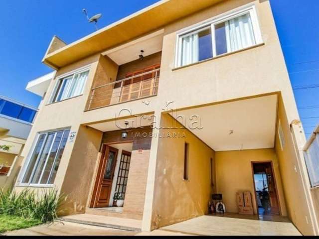 Casa com 4 quartos à venda na Rua Wilma Perpétuo, 95, Mário Quintana, Porto Alegre por R$ 640.000