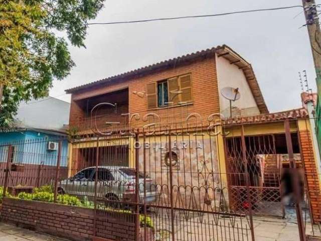 Casa com 6 quartos à venda na Rua Valparaíso, 945, Jardim Botânico, Porto Alegre por R$ 750.000