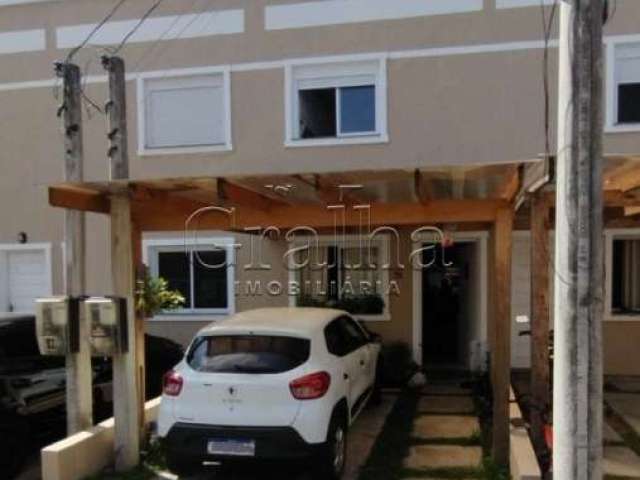 Casa em condomínio fechado com 2 quartos à venda na Rua Capitão Pedroso, 416, Restinga, Porto Alegre por R$ 200.000