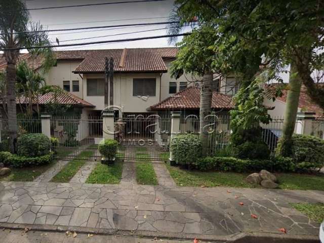 Casa em condomínio fechado com 3 quartos à venda na Rua Manoel Lopes Meirelles, 80, Jardim Itu Sabará, Porto Alegre por R$ 1.007.000