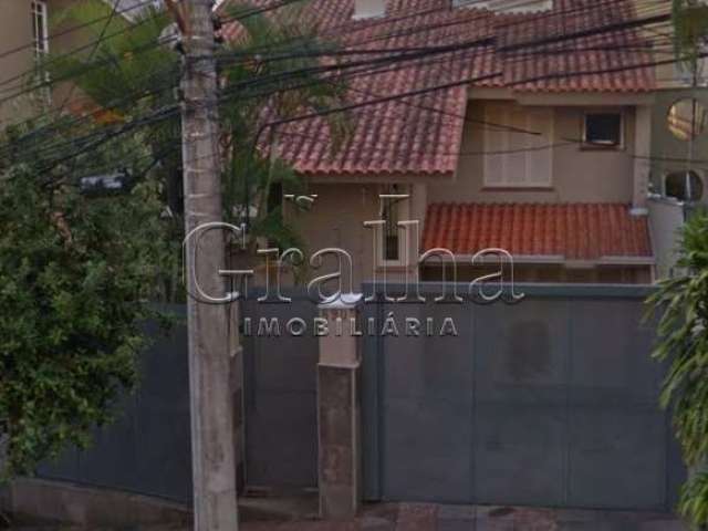 Casa com 4 quartos à venda na Rua Miguel Couto, 890, Menino Deus, Porto Alegre por R$ 1.100.000