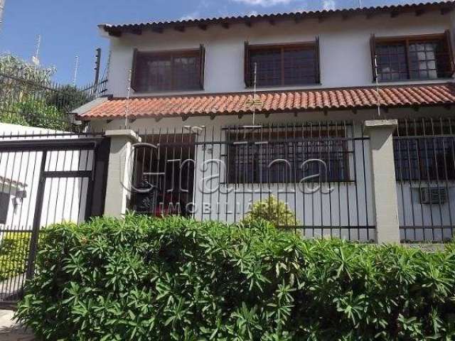 Casa com 5 quartos à venda na Rua Miracema, 27, Chácara das Pedras, Porto Alegre por R$ 1.400.000
