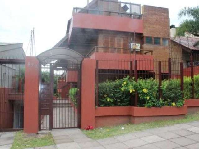 Casa em condomínio fechado com 4 quartos à venda na Rua Silveiro, 870, Menino Deus, Porto Alegre por R$ 1.780.000