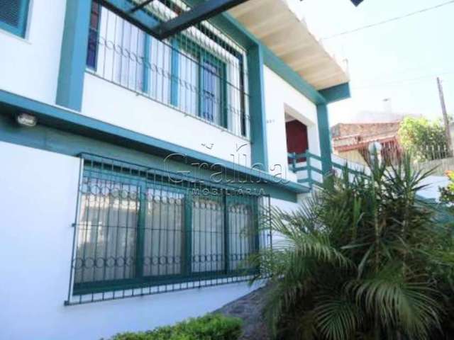 Casa com 4 quartos à venda na Rua Caixa Econômica, 307, Santa Tereza, Porto Alegre por R$ 1.200.000