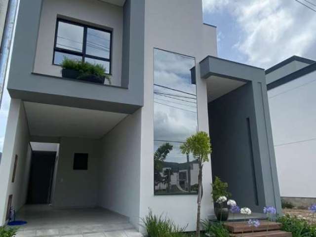 Casa em condomínio fechado com 3 quartos à venda no Beira Rio, Biguaçu  por R$ 1.200.000