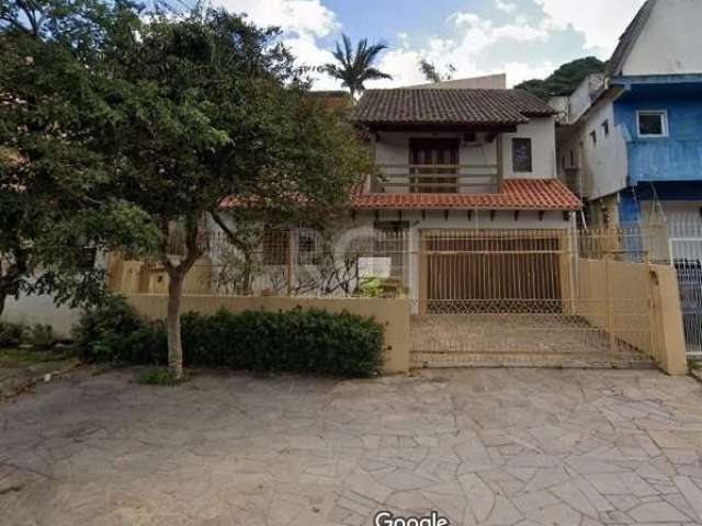 Casa com 3 quartos à venda na Octavio de Souza, Nonoai, Porto Alegre, 240 m2 por R$ 590.000