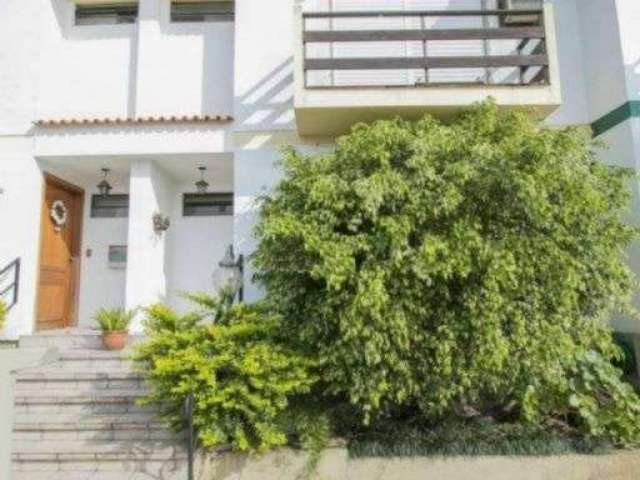 Casa em condomínio fechado com 3 quartos à venda na Rua Joaquim Cruz, Santo Antônio, Porto Alegre, 156 m2 por R$ 770.000