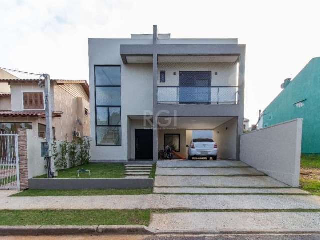 Casa em condomínio fechado com 3 quartos à venda na Rua Arahy Borges Ortiz, Mário Quintana, Porto Alegre, 186 m2 por R$ 890.000