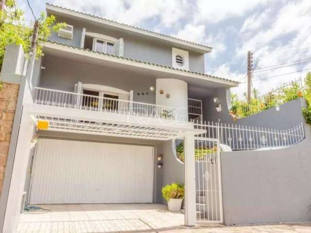 Casa com 3 quartos à venda na Rua Doutor Barcelos, 654, Tristeza, Porto Alegre por R$ 1.280.000