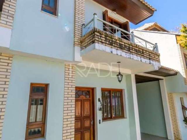 Casa em condomínio fechado com 3 quartos à venda na Rua João Mendes Ouriques, 594, Jardim Isabel, Porto Alegre por R$ 695.000