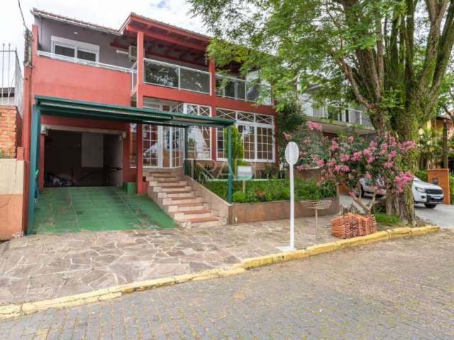 Casa em condomínio fechado com 3 quartos à venda na Rua Professor Antônio José Remião, 15, Espírito Santo, Porto Alegre por R$ 850.000