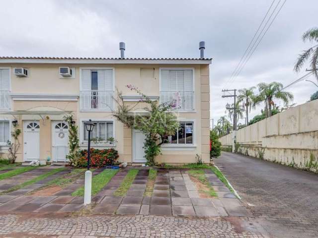 Casa em condomínio fechado com 2 quartos à venda na Avenida da Cavalhada, 5075, Cavalhada, Porto Alegre por R$ 340.000