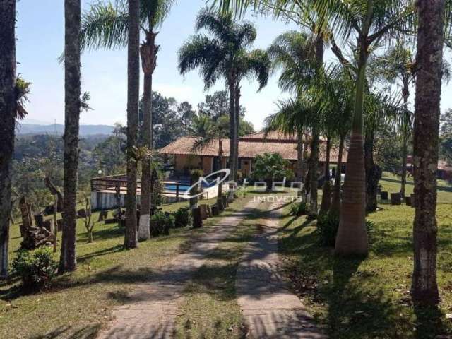 Chácara com 02 casas, 09 dormitórios ao total, à venda, 10.800 m² por R$ 2.000.000 - Parque Agrinco - Guararema/SP