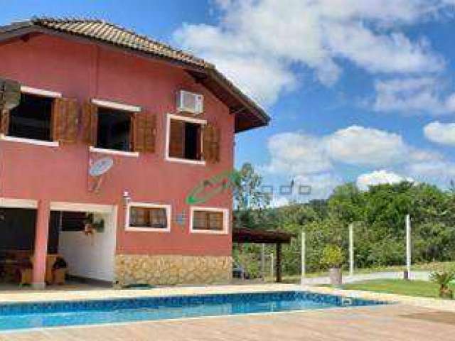 Casa com 4 dormitórios à venda, 400 m² por R$ 2.200.000,00 - Condomínio Residencial Alpes de Guararema - Guararema/SP