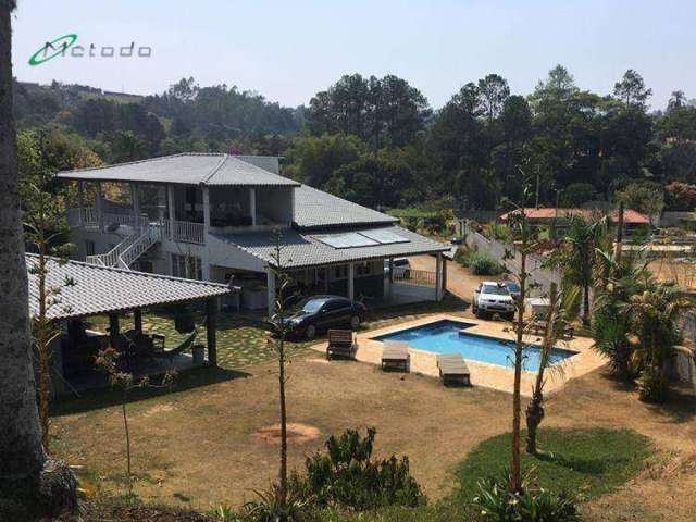 Chácara com 4 dormitórios à venda, 5000 m² por R$ 1.700.000 - Parque Agrinco - Guararema - SP