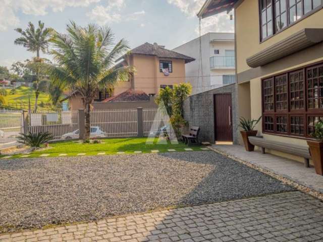 Casa com 4 quartos à venda na Alfredo Rusins, 35, Boehmerwald, Joinville por R$ 890.000