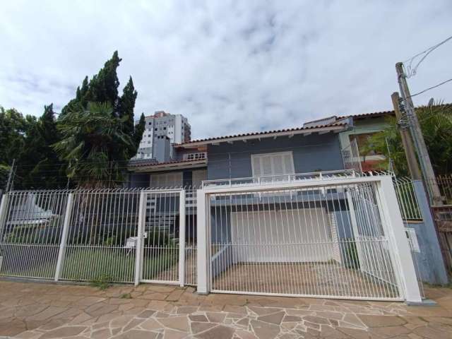 Casa com 3 quartos à venda na Rua Pompílio Gomes, 407, Dom Feliciano, Gravataí, 230 m2 por R$ 850.000