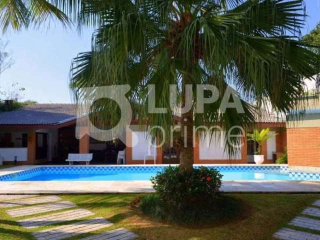Casa no condomínio Acapulco de frente para a praia 491 m2 com 4 suítes, 06 vagas de garagem