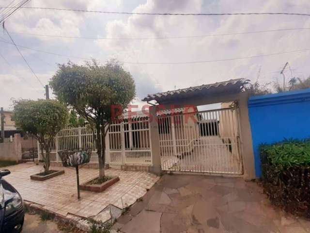 Casa com 4 dormitórios à venda por R$ 300.000,00 - Guajuviras - Canoas/RS