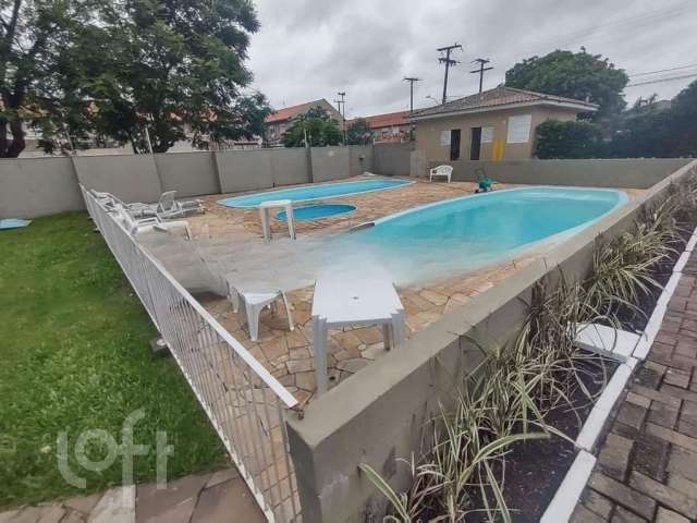 Casa em condomínio fechado com 2 quartos à venda na Rua Treze de Maio, 630, Rio Branco, Canoas por R$ 275.000