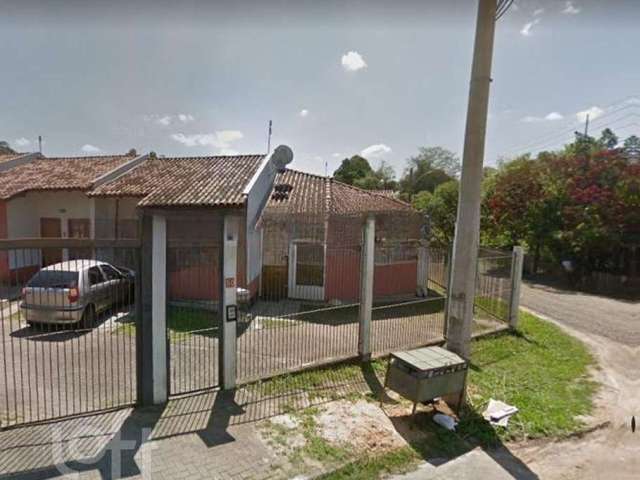 Casa em condomínio fechado com 1 quarto à venda na Rua Ilha Encantada, 50, Olaria, Canoas por R$ 165.000