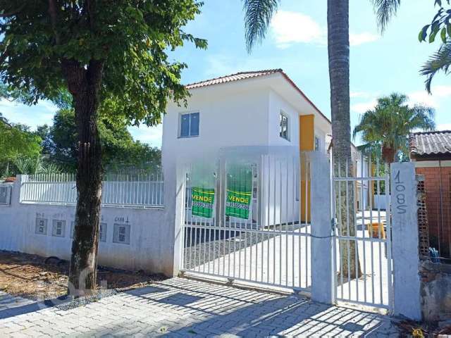 Casa em condomínio fechado com 2 quartos à venda na Gildo de Freitas, 1085, Guajuviras, Canoas por R$ 229.900