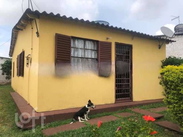 Casa em condomínio fechado com 2 quartos à venda na Beco Três, 17, Guajuviras, Canoas por R$ 222.700