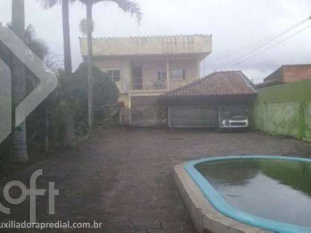 Casa em condomínio fechado com 4 quartos à venda na Rua Santos Dumont, 567, Niterói, Canoas por R$ 650.000