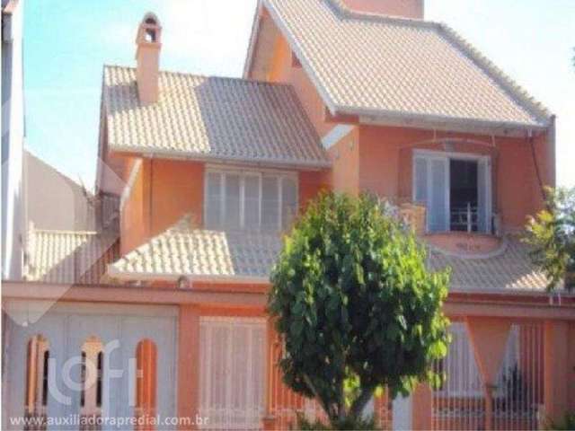 Casa em condomínio fechado com 4 quartos à venda na Rua das Petúnias, 352, Estância Velha, Canoas por R$ 898.200
