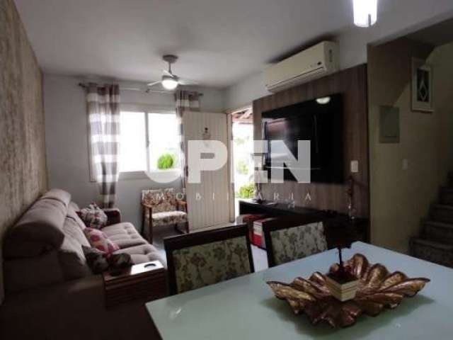 Casa em condomínio fechado com 3 quartos à venda na Rua Barão de Mauá, 300, Fátima, Canoas por R$ 470.000