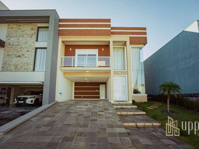 Casa com 3 dormitórios à venda, 155 m² por R$ 1.100.000,00 - Reserva do Arvoredo - Gravataí/RS