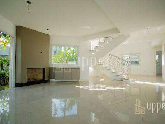 Casa com 3 dormitórios à venda, 219 m² por R$ 2.650.000,00 - Alphaville - Gravataí/RS